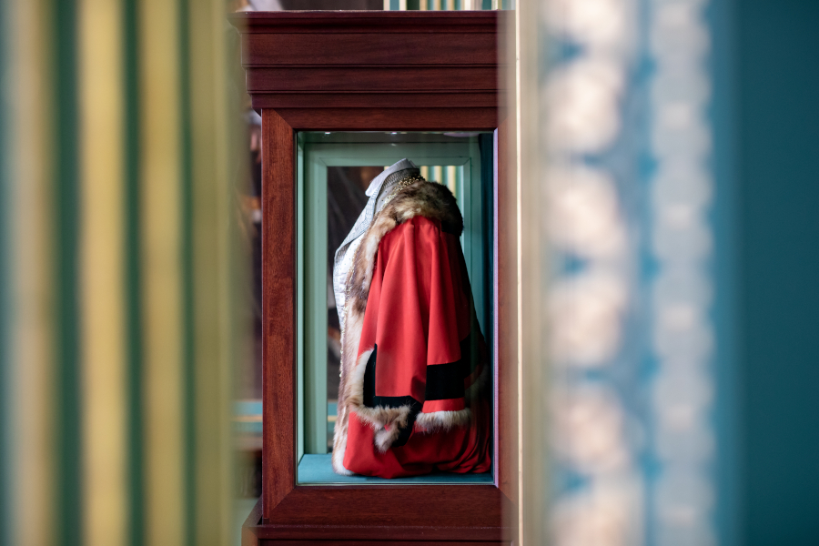 Clothes in a display cabinet within the Mansion House